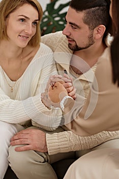 Family with a child at a psychotherapist at the reception