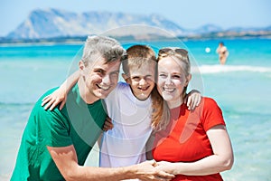 Family with child at sea