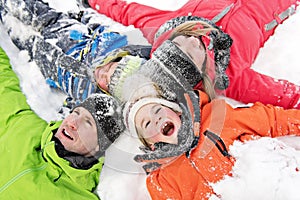 Family and child spending time outdoor in winter