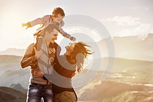 Family child walking mountains sunset