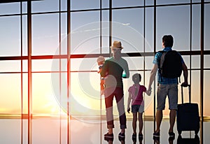 Family with children at the airport