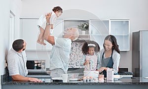 Family, children and baking with a senior man bonding with his granddaughter in the kitchen of a home. Love, grandparent
