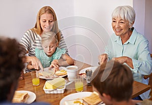 Family, children and breakfast food with grandmother for healthy nutrition meal, wellness or bonding. Women, eating and