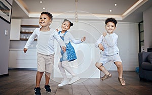 Family, children and siblings dance in a house with energy, moving and music at home together. Love, freedom and kids in