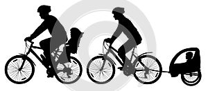 Family with children traveling on bikes. Mountain bike silhouette. Cyclist with a child stroller.