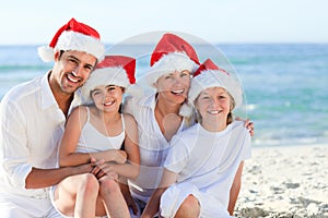 Family during Christmas day at the beach