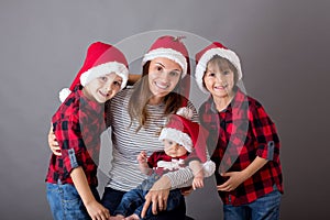 Family christmas portrait, isolated on gray, studio image