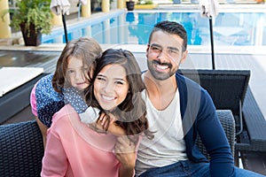 Family close to the pool