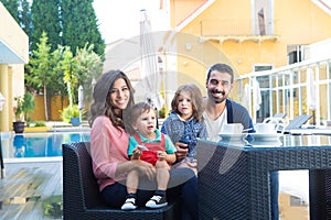 Family close to the pool