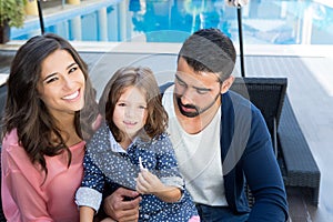 Family close to the pool