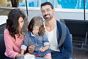 Family close to the pool