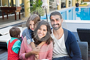 Family close to the pool