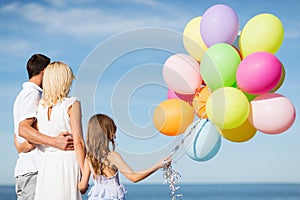 Family with colorful balloons