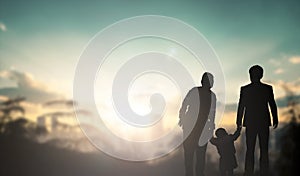 Family concept: family at sunset background