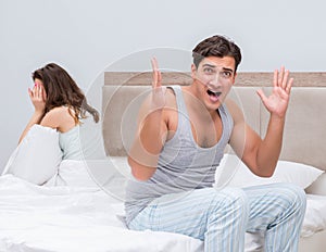 Family conflict with wife and husband in bed