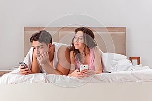 The family conflict with wife husband in bed