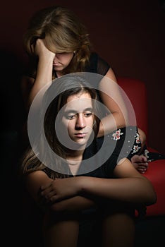 Family conflicts - Sad teenage girl and her worried mother