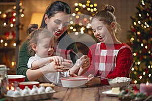 Family cooking Christmas cookies