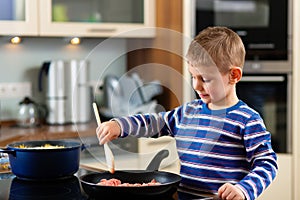 Family cooking in kitchen