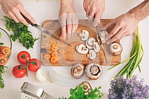 Family Cooking Meal Preparation Together Cutting Ingredients