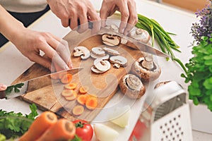 Family Cooking Meal Preparation Together Cutting Ingredients photo