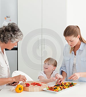 Family cooking together in the kitchen