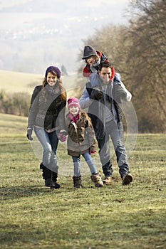 Family on country walk in winter