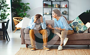 Family couple quarrels in a conflict at home