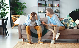 Family couple quarrels in a conflict at home photo