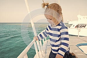Family cruise vacations. Kid boy toddler travelling sea cruise. Child in striped shirt looks like young sailor. Child