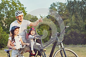 Family On Cycle Ride In Countryside