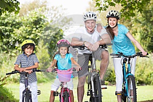 Family On Cycle Ride In Countryside