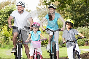 Family On Cycle Ride In Countryside