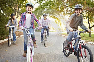 Family On Cycle Ride In Countryside