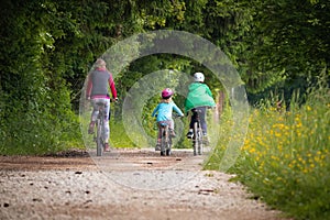 Family cycling in the nature