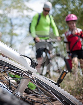 Family cycling outdoors