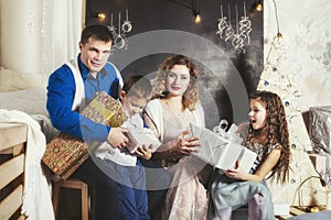 Family, dad, mom and kids happy with beautiful smiles to celebrate Christmas