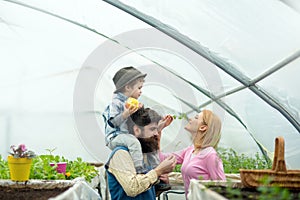 Family day. fmily day holiday on 15 may. fmily day with happy family in greenhouse. love