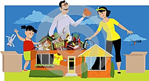 Family decluttering a house