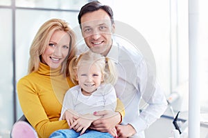 Family in dental clinic photo