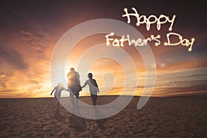 Family on desert with father day text