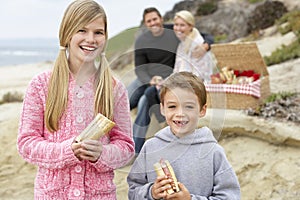 Family Dining Al Fresco At The Beach