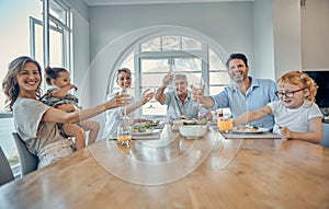 Family, dinner food and cheers of a mother, senior people and children happy at home. Portrait of a happy toast, mother