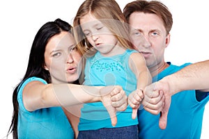 Family with disagreeable faces gives their thumbs