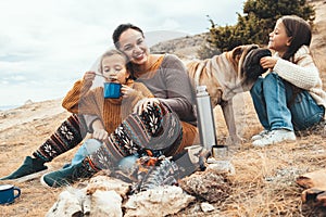 Family with dog in autumn hike