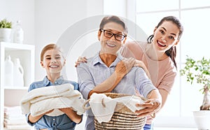 Family doing laundry at home
