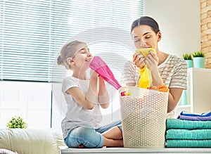 Family doing laundry at home