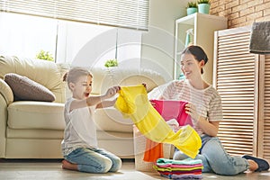 Family doing laundry at home