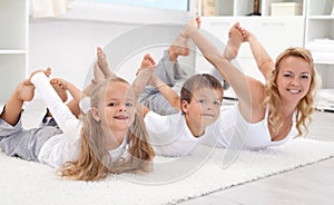 Family doing stretching exercises at home