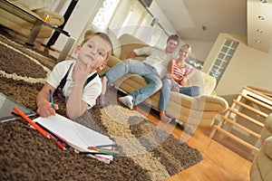 Family drawing on school board at home photo